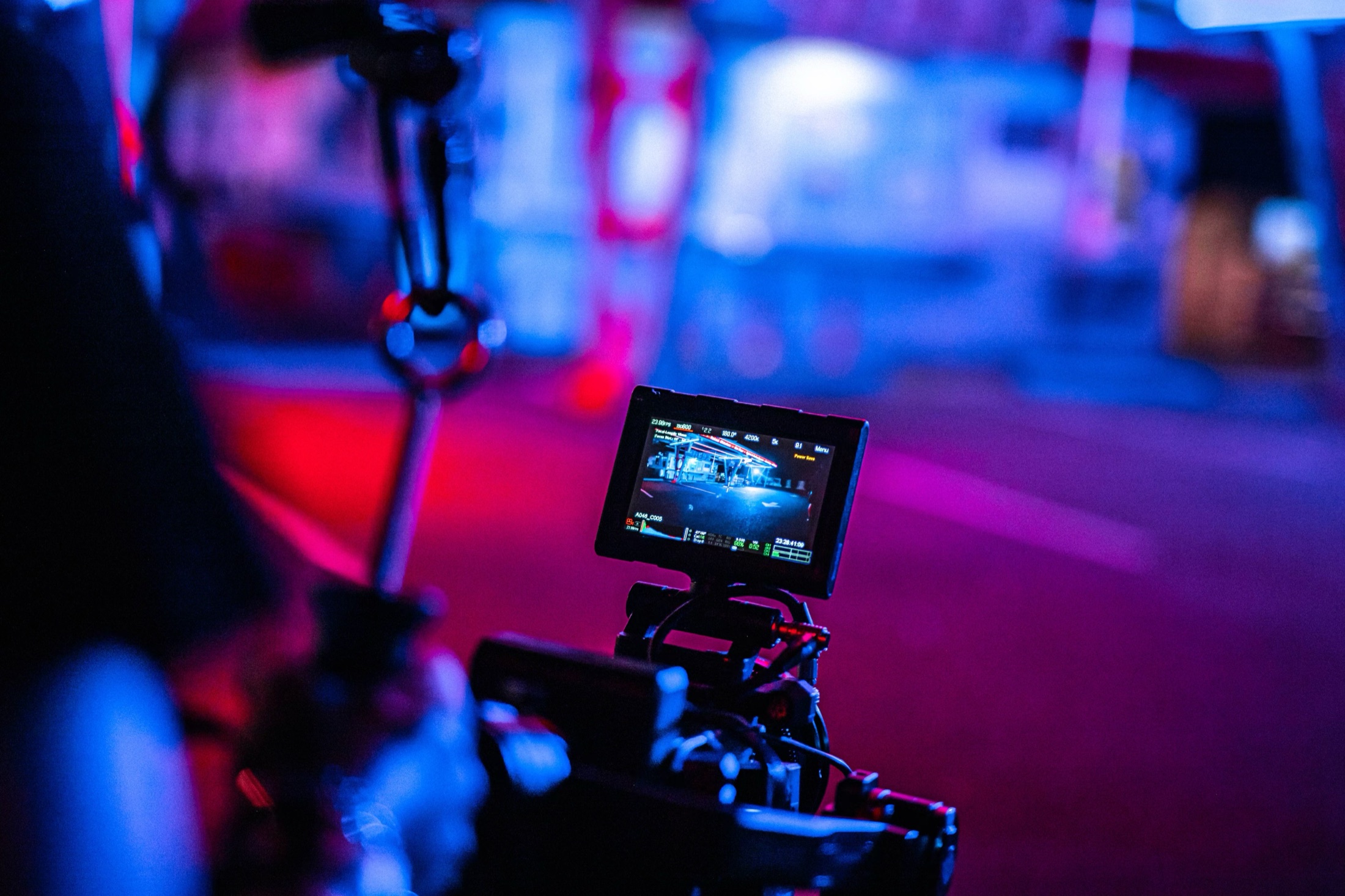Live camera monitor on a night exterior production.